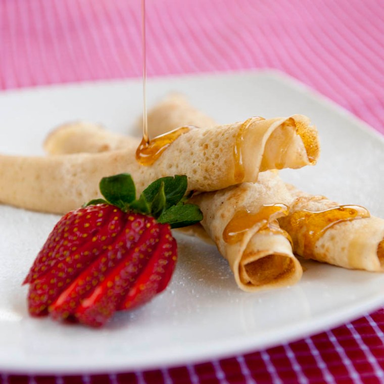 Yummy pancakes, made that little bit extra special with the compliments of Abram Lyle and his wonderful golden syrup. (© All Rights Reserved)