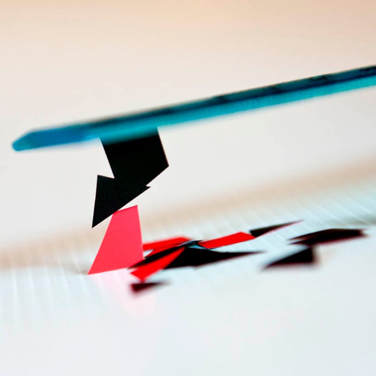 Making paper pieces fly - the magic of static electricity.(© All Rights Reserved)