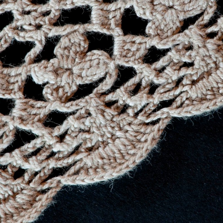 There's a thin line between tatting and crocheting, which also creates patterns with knotted yarn. Both these crafts are used to create patterns that are almost mathematical in their complexity. With apology to tatters everywhere, my illustration above is a piece of crochet work rather than tatting, but unfortunately I wasn't able to find a nice example of tatting to photograph.(© All Rights Reserved)